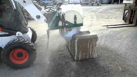 grapple saw for skid steer|skid steer mounted concrete saw.